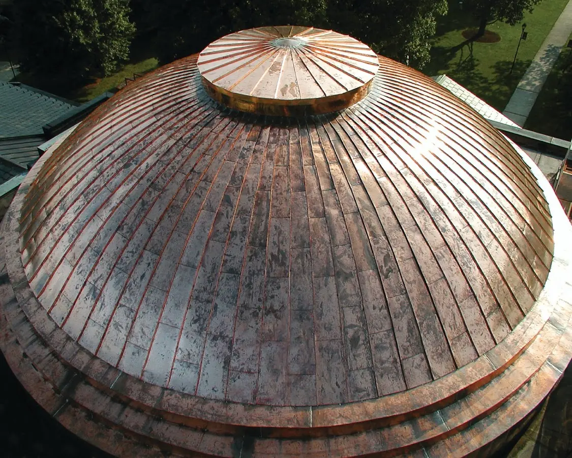 Craftsman Roofing crew installing a new roof in East Prentiss